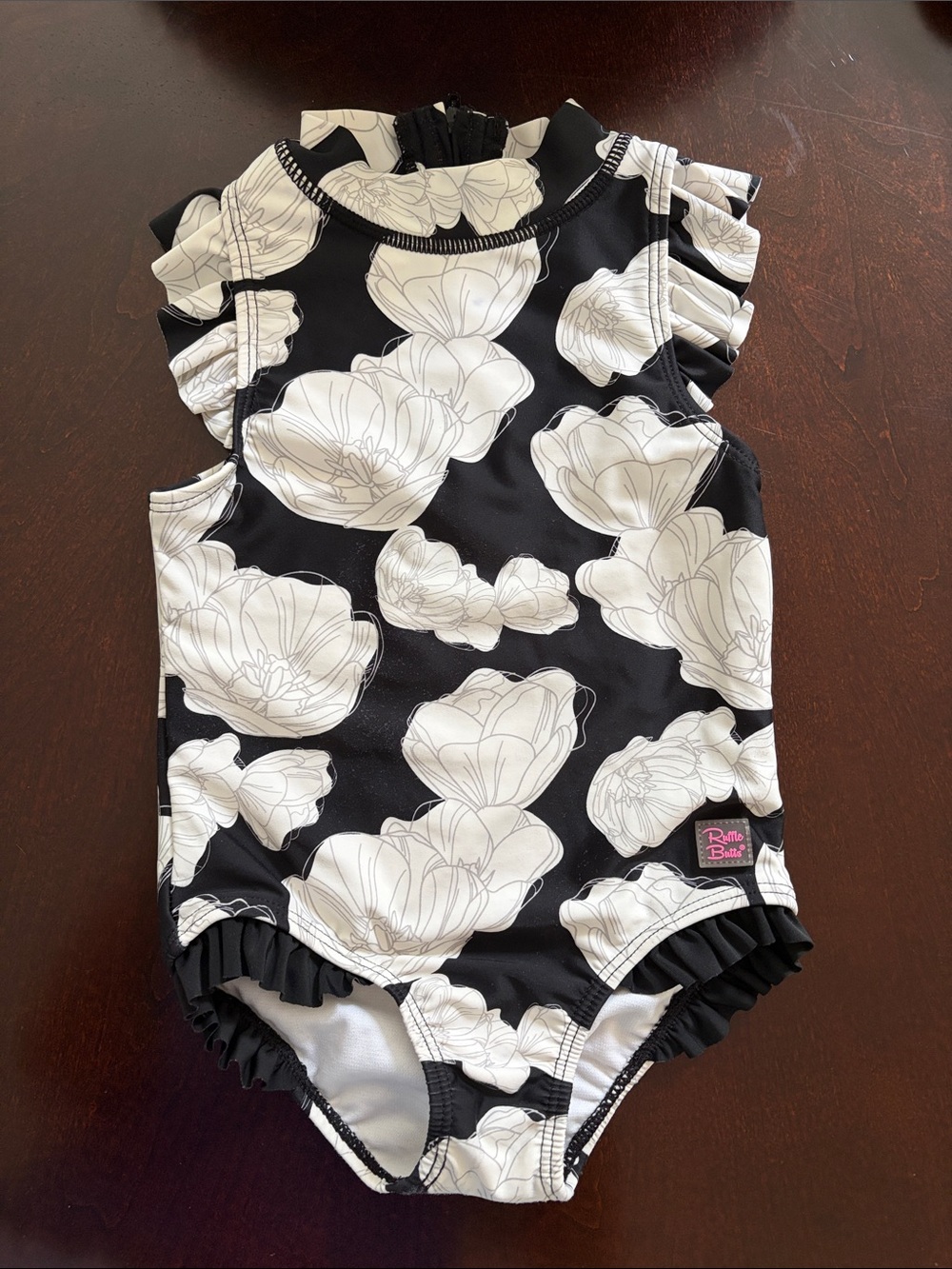 Ruffle Butts Black and White Floral Ruffle One-Piece Swimsuit